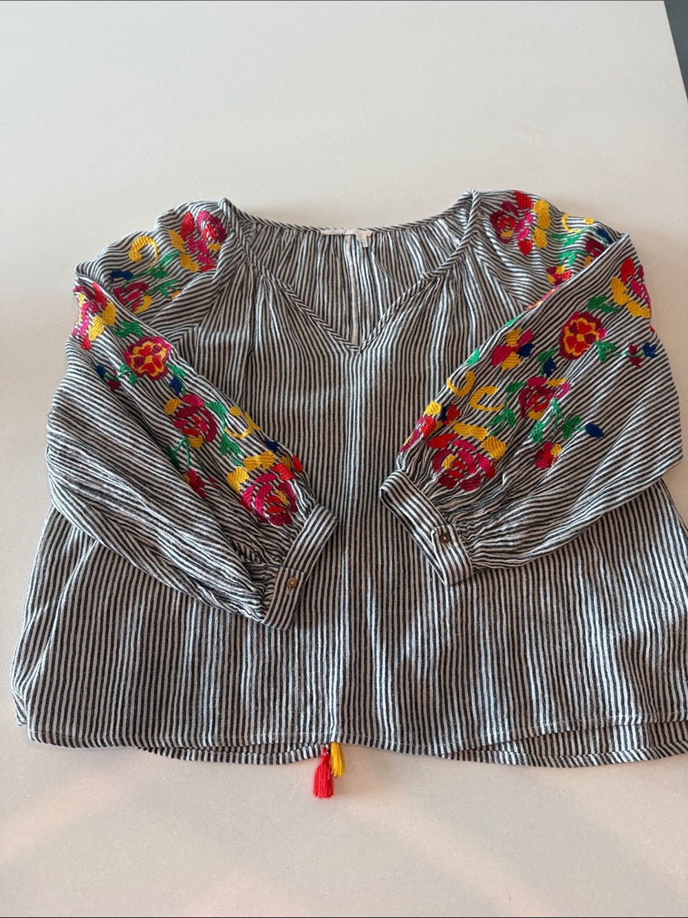 Floreat Black-and-White Striped Tunic with Red and Yellow Floral Embroidery